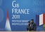 Two police officer patrol in fron of the Deauville Congress Center, in Deauville, western France Sunday May 22, 2011 where world leaders of the G-8 will meet for a summit May 26 and May 27.