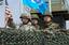 Republic of Korea (ROK) and United States (U.S.) soldiers monitor the Korean Demilitarized Zone from atop Observation Post (OP) Ouellette. View looking north from south.