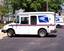 USPS Mail Trucks parked in the Post Office in Conneaut, Ohio .