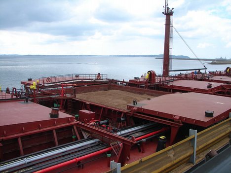 The OBO-carrier Maya. The picture is showing both the cargo hold hatches used for bulk and the pipes used for oil