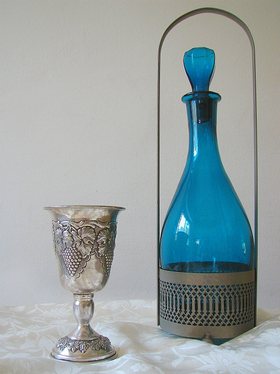 Silver kiddush cup and wine decanter