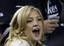 Actress Kate Hudson cheers during the third inning of Game 6 of the Major League Baseball World Series between the New York Yankees and Philadelphia Phillies Wednesday, Nov. 4, 2009, in New York.