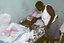 File - A 28-year-old man with AIDS/HIV at the Hospital Sainte Croix in Leogane, Haiti.