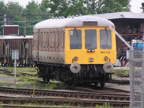 Class 960 departmental unit, no. 960015 at Crewe Diesel Depot on 1 June 2003. This unit is the former Class 122 no. 55019, and is painted in Railtrack's old brown livery. It is operated by Network Rail as a sandite application unit.