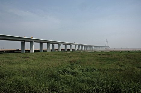 Hangzhou Bay Bridge (simplified Chinese: 杭州湾大桥; traditional Chinese: 杭州灣大橋; pinyin: Hángzhōu Wān Dàqiáo), is a long highway bridge with a cable-stayed portion across Hangzhou Bay of eastern China. It connects the municipalities of Jiaxing and Ningbo in Zhejiang province. At 35.673 km (22 mi) in length, Hangzhou Bay Bridge is the longest trans-oceanic bridge in the world, but it does not have the longest cable-stayed main span. Construction of the bridge was completed on June 14, 2007,[1] and an