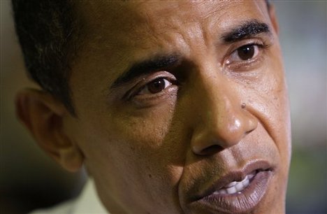 Democratic presidential candidate Sen. Barack Obama, D-Ill., talks about the federal rescue plan while he buys flowers for his wife for their anniversary at Penny's Flowers in Glenside, Pa. Friday, Oct. 3,