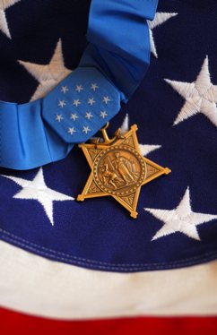 The Medal of Honor rests on a flag during preparations for an award ceremony for Lt. Michael P. Murphy.