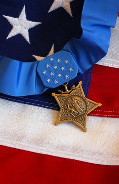 The Medal of Honor rests on a flag during preparations for an award ceremony for Lt. Michael P. Murphy.