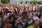 Kashmiri Muslim devotees pray as an unseen custodian holds a Holy Relic, believed to be a hair from the Prophet Mohammad's beard, at Hazratbal Shrine in Srinagar on June 30, 2011, during celebrations for Miraj-Ul-Alam (Ascension to Heaven). Thousands of Muslims converge annually for celebrations at the shrine near the summer capital of the state of Jammu and Kashmir.