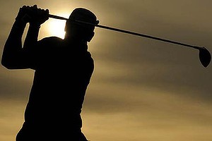 Kurt Barnes of Australia tees off on the 18th hole during the first round of the British Open golf championship at Royal St George's in Sandwich, southern England July 14, 2011.