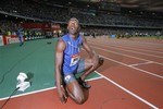 Jamaican champion Usain Bolt looks up to check the times after crossing the finish line to win the Men's 200m during the final of the IAAF Grand Prix track and field meeting at the Stade de France stadium in Saint Denis outside Paris. Friday, July 8, 2011.