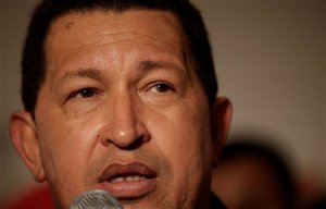 Venezuela's President Hugo Chavez speaks to the press upon his arrival to Porlamar, Margarita Island, Venezuela, Friday, Sept. 25, 2009.