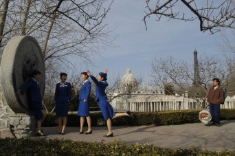 Zhao Tao as Tao (left) and friends at World Park in THE WORLD. Courtesy of Zeitgeist Films