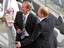 Former German soccer national team coach Berti Vogts, left, talks with Matthias Sammer, right, sports director of the German football association, after the Germany v Sweden Round of 16 soccer match at the World Cup stadium in Munich, Germany, Saturday,