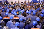 French President Nicolas Sarkozy addresses employees as he visits the Rio Tinto Alcan aluminium plant, Thursday, April 7, 2011 in Issoire, central France. Rio Tinto is the world's biggest producer of aluminium and bauxite.