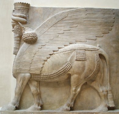 Human-headed winged bull (shedu), Assyria, limestone, 8th century BCE.