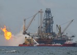 100713-G-5030M-002-- GULF OF MEXICO --  The Q4000 flares off oil and gas Tuesday as Coast Guard Cutter Resolute approaches the "City at Sea" at the site of the BP oil spill Tuesday. The Resolute is serving as search-and-rescue, plane, and hurricane guard for the largest oil spill response in U.S. history. Coast Guard photo by Petty Officer 1st Class John Masson. (940490) ( )