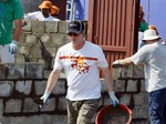 Australian cricketer Steve Waugh looks works to build a house as part of the 23rd Jimmy Carter project in Patan Village, 100 kilometers (63 miles) south east of Mumbai, India, Monday, Oct. 30, 2006. 23rd Jimmy Carter Work Project will build 100 homes in a week for the underprivileged section of the society.