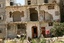 RAFAH , GAZA STRIP - JULY 13  2009: Palestinian children play in front of their ruined houses, hit during Israel's 22-day offensive over Gaza, on July 05 2009