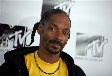 Snoop Dogg poses in the press room during MTV's 