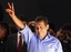 Presidential candidate Ollanta Humala gestures to supporters after the presidential runoff election in Lima, Peru, Sunday June 5, 2011.