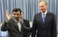 Iranian President Mahmoud Ahmadinejad, left, gestures as he welcomes Russia's Security Council Secretary Nikolai Patrushev for their meeting at the presidency office, in Tehran, Iran, Tuesday, Aug. 16, 2011.