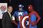 US Navy 050428-N-0295M-001 Secretary of Defense Donald Rumsfeld meets superheroes Captain America and Spider-Man during the unveiling of a comic book that will be distributed free to U.S. forces in Iraq and around the world