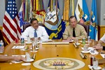 Secretary of Defense Leon E. Panetta, left, speaks with Chairman of the Joint Chiefs of Staff Adm. Mike Mullen.