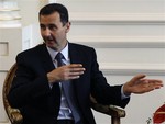 Syrian President Bashar Assad speaks with his Turkish counterpart Abdullah Gul, unseen, during their meeting in Istanbul, Turkey, Monday, June 7, 2010.