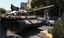 In this image from video a captured tank bearing a rebel flag maneuvers on a street in Zawiya, Libya Friday Aug.19 2011 as they battled for control of the strategic central square against forces loyal to Moammar Gadhafi. Rebel forces were reported to have expelled government forces from Zawiya, a coastal city just 30 miles (50 kilometers) west of Tripoli, on Saturday Aug. 20.