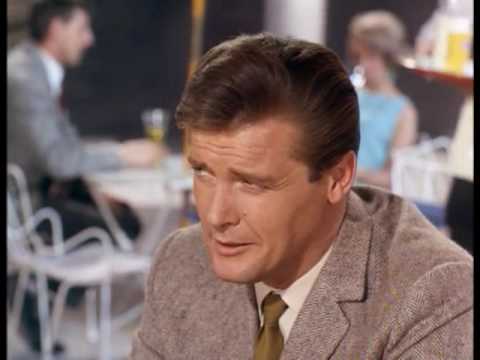 roger moore & lois maxwell in a scene from 'the saint'