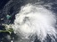 Natural-colour image of Hurricane Irene. Storm clouds cover part of the Dominican Republic, and all of Puerto Rico, 22 August, 2011.