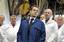 French President Nicolas Sarkozy and advisor Brice Hortefeux, right, visit the Rio Tinto-Alcan international aluminum plant, Thursday, April 7, 2011 in Issoire, central France. Rio Tinto Alcan is Canada-based worldwide industry which is operating in bauxite and aluminum production.