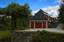 The stable at Gamlehaugen, Bergen, Norway.The stable is a red building located next to the road. It was originally located near the caretaker's house, which had to be demolished in 1986 when the rock it was built on was blasted away to make room for the widening of the main road.