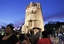 Visitors come to the first day of the "soft opening" of the Martin Luther King, Jr. Memorial at dusk ahead of its dedication this weekend in Washington, Monday, Aug. 22, 2011.