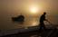 Seaman Apprentice Brett O. Davidson, 20, of Orlando Fl., works a line onboard the U.S. Coast Guard Cutter Adak, homeported in Sandy Hook, NJ., in the North Arabain Gulf off the coast of Iraq April 10, 2003. The Adak is one of four 110 foot patrol boats in the Gulf region in support of Operation Iraqi Freedom - the first time 110 foot patrol boats have been deployed to a theater of war since Vietnam. (133742) ( 282.jpg )