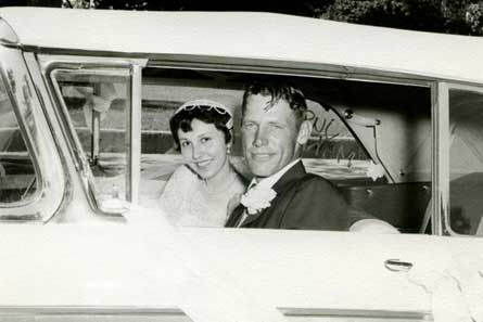 Wedding couple in a borrowed Ford Edsel