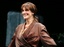 Julia Roberts smiles during the curtain call at the Broadway opening of "Three Days of Rain," which also stars Paul Rudd and Bradley Cooper, Wednesday, April 19, 2006, in New York.