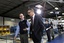 President Barack Obama walks with Thompson Creek Window Company President Rick Wuest, left, as he tours the facility in Landover, Md., Friday, Jan. 7, 2011. Obama later announced Gene Sperling as the new head of the National Economic Council, and other new members of his his economic team, during comments on nation's latest unemployment reports