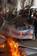 An activist of Jammu Kashmir Peoples freedom league burn Israel flag as other shout Anti Israel and Anti America slogans during a protest against assault on Gaza, in Srinagar, the summer capital of Indian Kashmir, 12, January,2009.