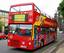 An open top bus converted from a standard service bus