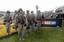 Rangers from 1st Battalion, 75th Ranger Regiment, Fort Benning, G.A. stand at attention on the infield of the Lowes Motor Speedway as they are honored for their service to the nation during the Coca Cola 600 NASCAR pre-race military appreciation show in Concord, N.C. on May 24, 2009. (U.S. Army photo by Trish Harris)