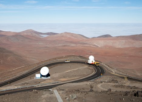 ESO astronomer Yuri Beletsky captured images of the transport of one of the 1.8-metre Auxiliary Telescopes (AT) that compose, together with their larger 8.2-meter companions, ESO’s Very Large Telescope (VLT) array.