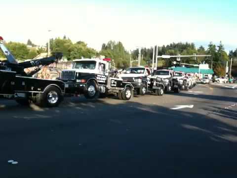 Tow truck towing a tow truck towing a tow truck...