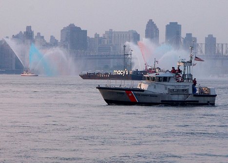 NEW YORK, New York (July 4)--A U.S. Coast Guard rescue boat, from Coast Guard Station Sandy Hook, NJ, patrols the East River near the Macy's fireworks barges July 04, 2002. Dozens of Coast Guard patrol and rescue boats provided security for the July 4th celebration in New York. USCG photo by PA2 Tom Sperduto (83276) ( JULY 4TH PATROL (FOR RELEASE) )