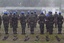 Uruguayan peacekeepers with the United Nations Stabilization Mission in Haiti (MINUSTAH) receive medals of recognition for their work, during a rainy ceremony in Les Cayes, Haiti., 25 August, 2011.