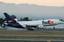 A DC-10 landing at San José. The Late-2000s recession and the Financial crisis of 2007–2010 hit parent company FedEx Corporation and its express division hard.