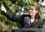 Alaska Gov. Sarah Palin gives a thumbs up during her resignation speech during a ceremony in Fairbanks, Alaska, Sunday, July 26, 2009, where Gov. Sarah Palin stepped down and turned over power to Lt. Gov. Sean Parnell.