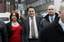 British National Party leader Nick Griffin, centre, arrives at at Leeds Crown Court to go on trial on race-hate charges arising out of an undercover documentary about the party, in Leeds, England, Monday Jan. 16, 2006.