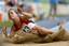 Canada's Jessica Zelinka lands during the long jump event of the women's heptathlon at the Pan American Games in Rio de Janeiro, Wednesday, July 25, 2007.